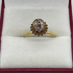 Elegant Gold Ring with Unique Stone